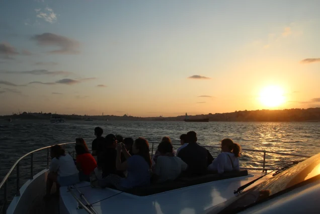 Guests on the back deck enjoying the Bosphorus sunset