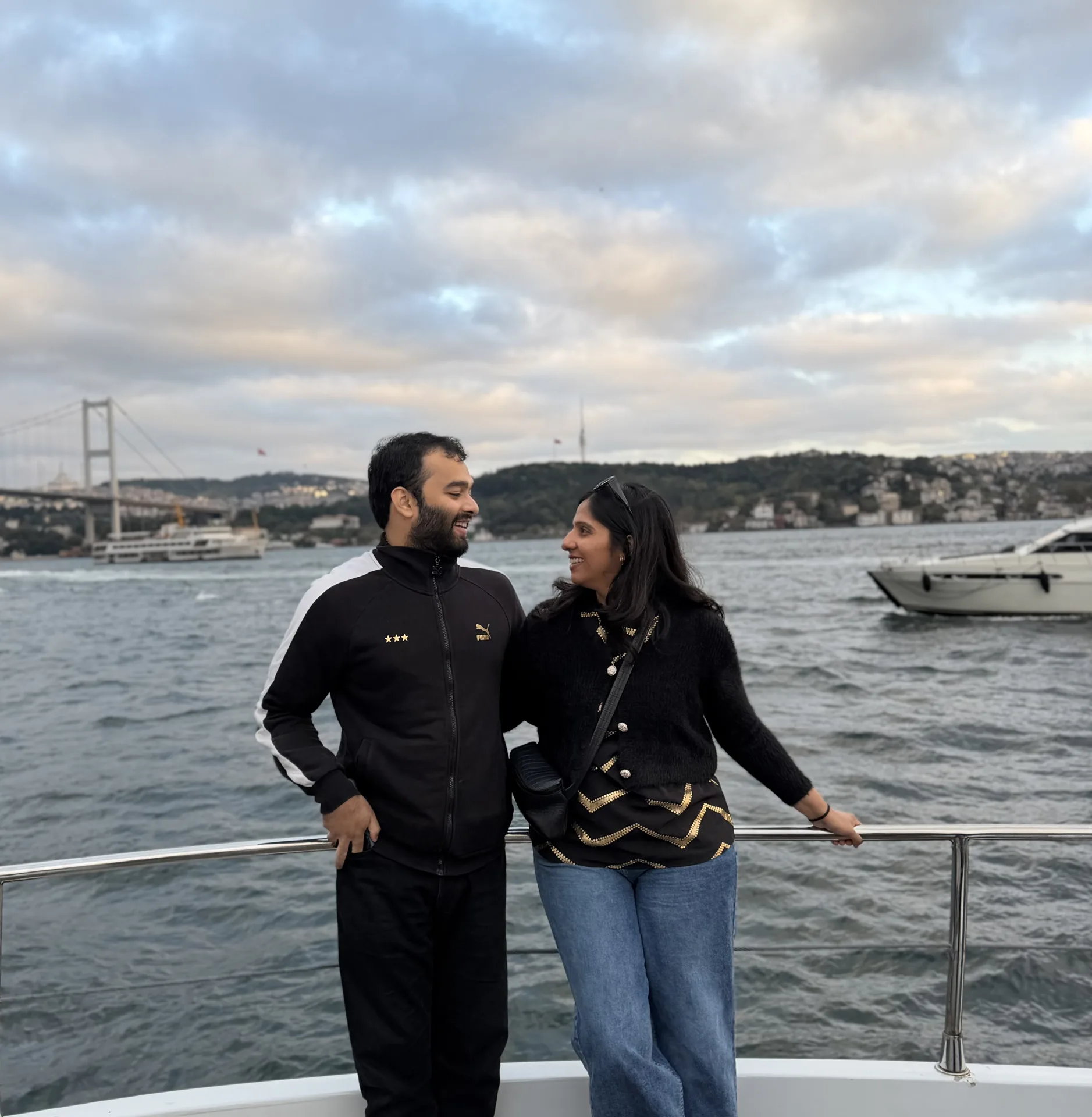 Private yacht on the Bosphorus at sunset — the view that makes this format work.